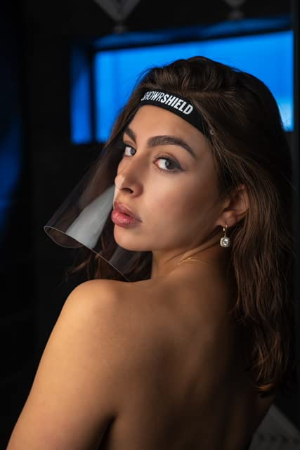 Plus-Keeps your face dry while you're showering & shampooing. Any reason to keep your face dry while in the shower.
