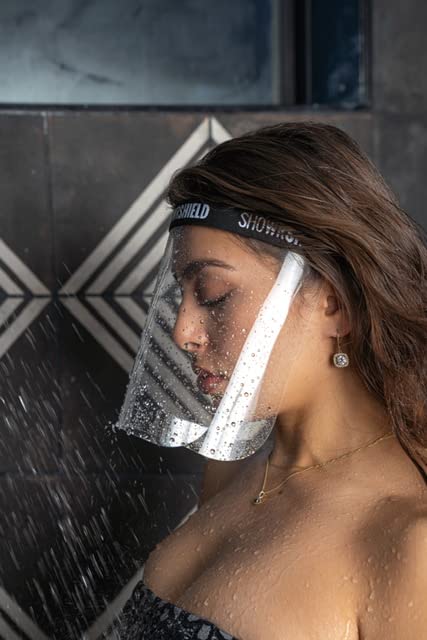 Plus-Keeps your face dry while you're showering & shampooing. Any reason to keep your face dry while in the shower.